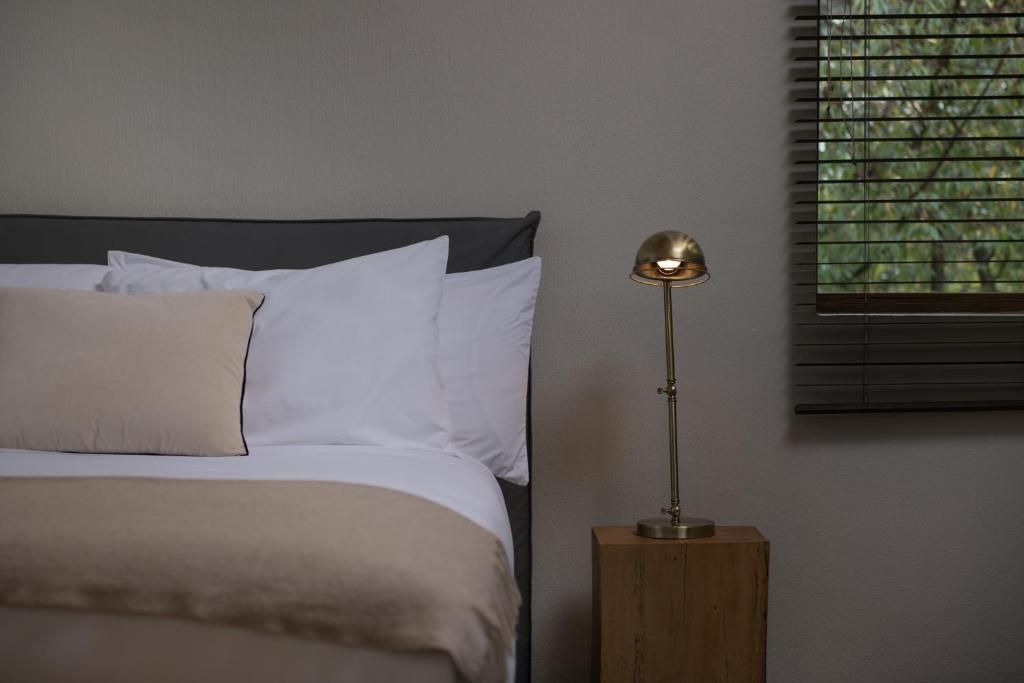 Ein Bett oder Betten in einem Zimmer der Unterkunft Andenia Boutique Hotel, Sacred Valley