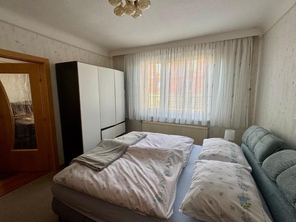 Ένα ή περισσότερα κρεβάτια σε δωμάτιο στο Wiener Melange