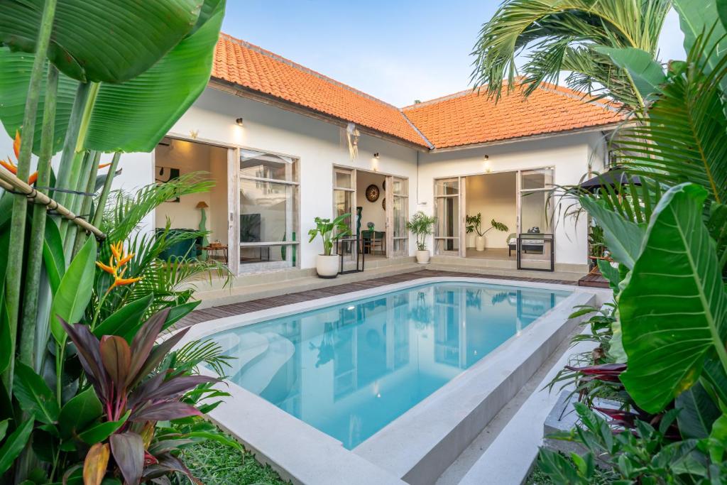 an image of a swimming pool in a villa at La Palma - Sleek, Stylish & Spacious - Brand New 2-Bedroom Villa with Large Pool in Canggu! in Canggu