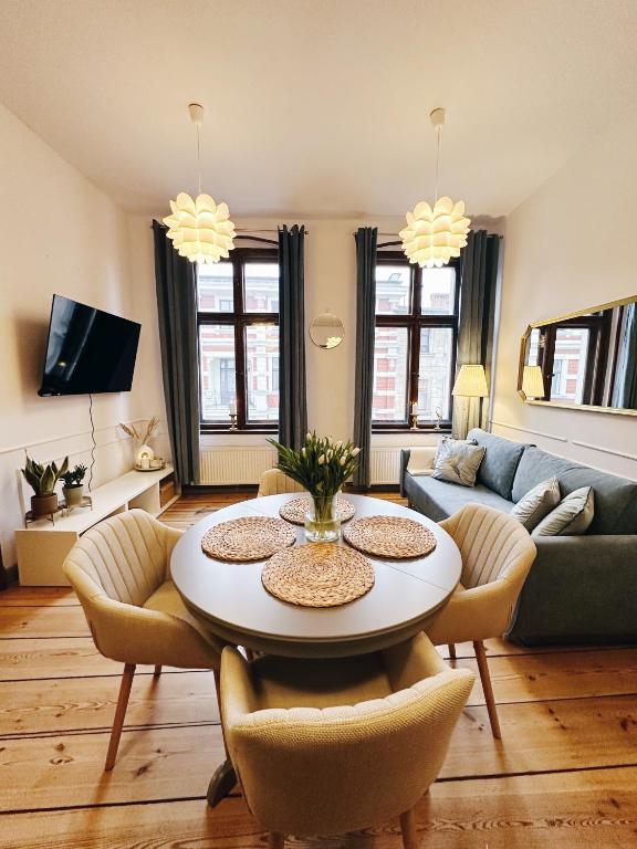 Televízia a/alebo spoločenská miestnosť v ubytovaní Best 2 Rest Apartment