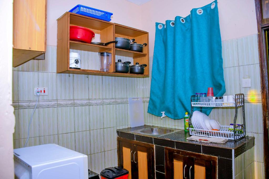 Koupelna v ubytování Dasha Studio apartment Bamburi D4
