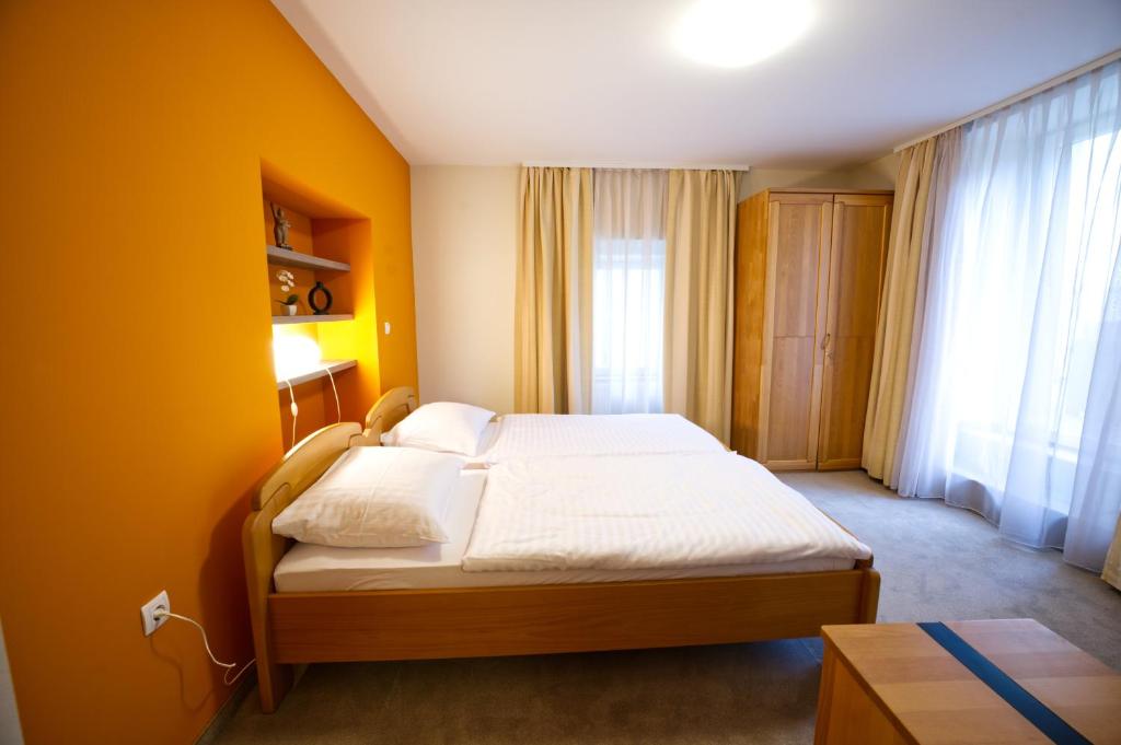 Postel nebo postele na pokoji v ubytování Vila Sofia