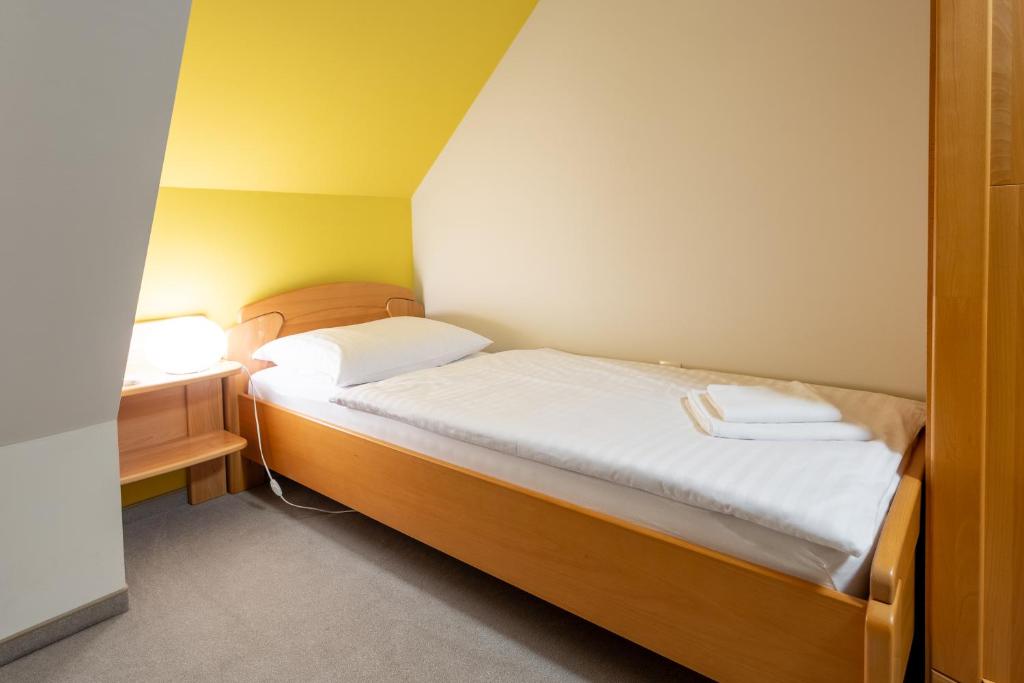 Postel nebo postele na pokoji v ubytování Vila Sofia