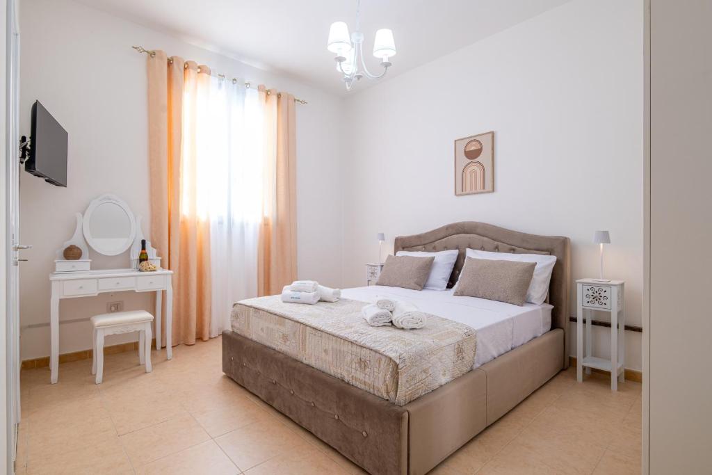 Postel nebo postele na pokoji v ubytování Deva Room