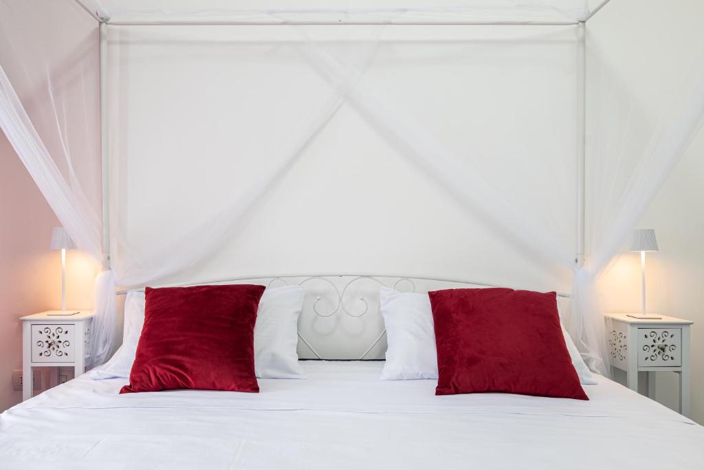 Postel nebo postele na pokoji v ubytování Deva Room