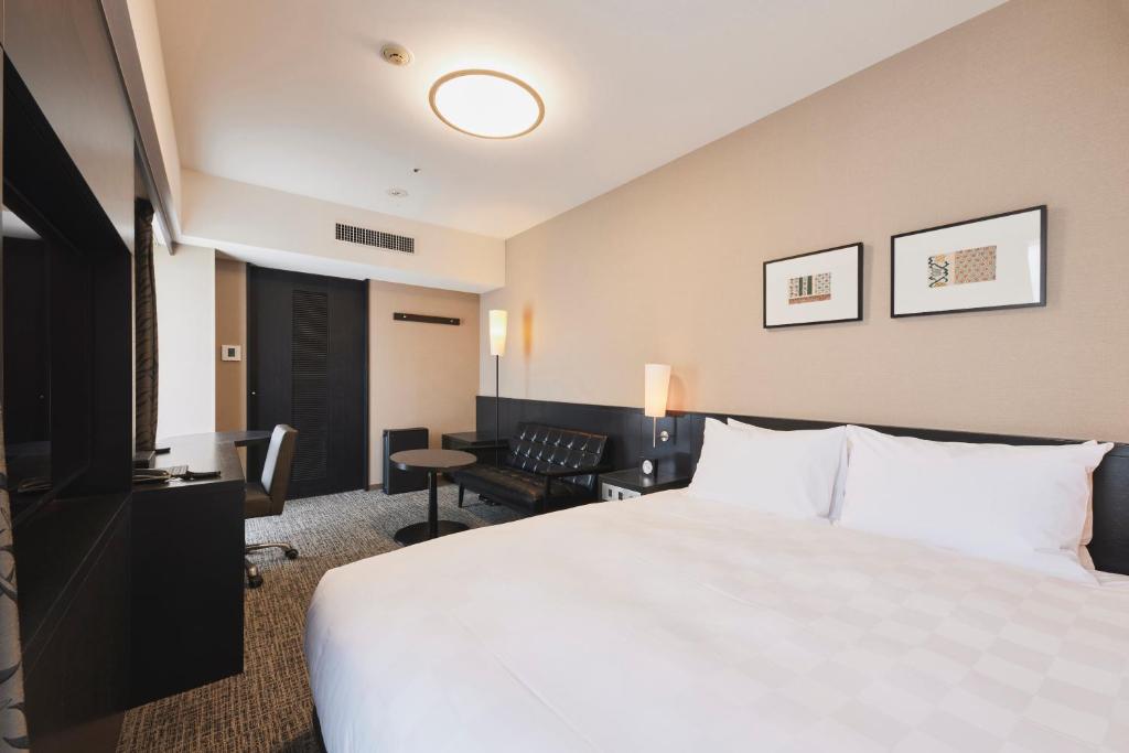 Tempat tidur dalam kamar di Richmond Hotel Nagasaki Shianbashi