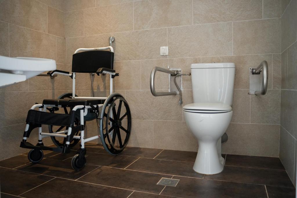 Koupelna v ubytování Coralli Hotel