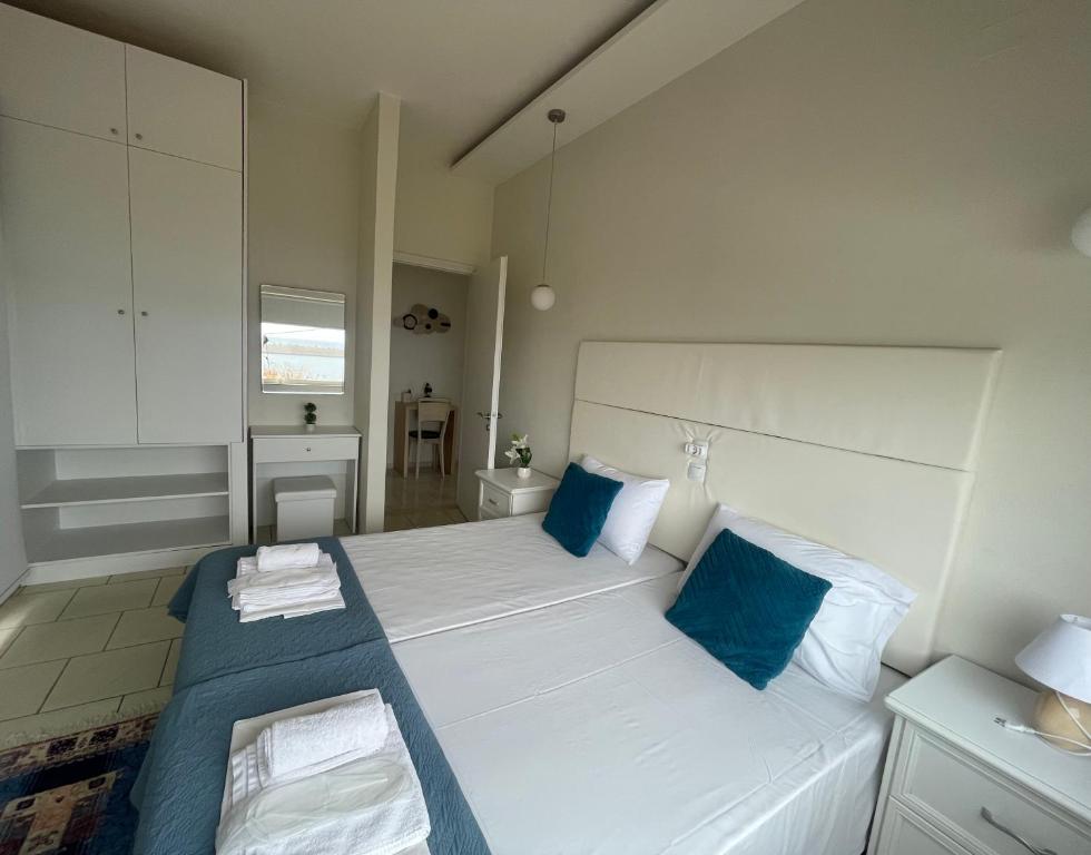 Postel nebo postele na pokoji v ubytování Sea View Apts & Suites by Pachiplex