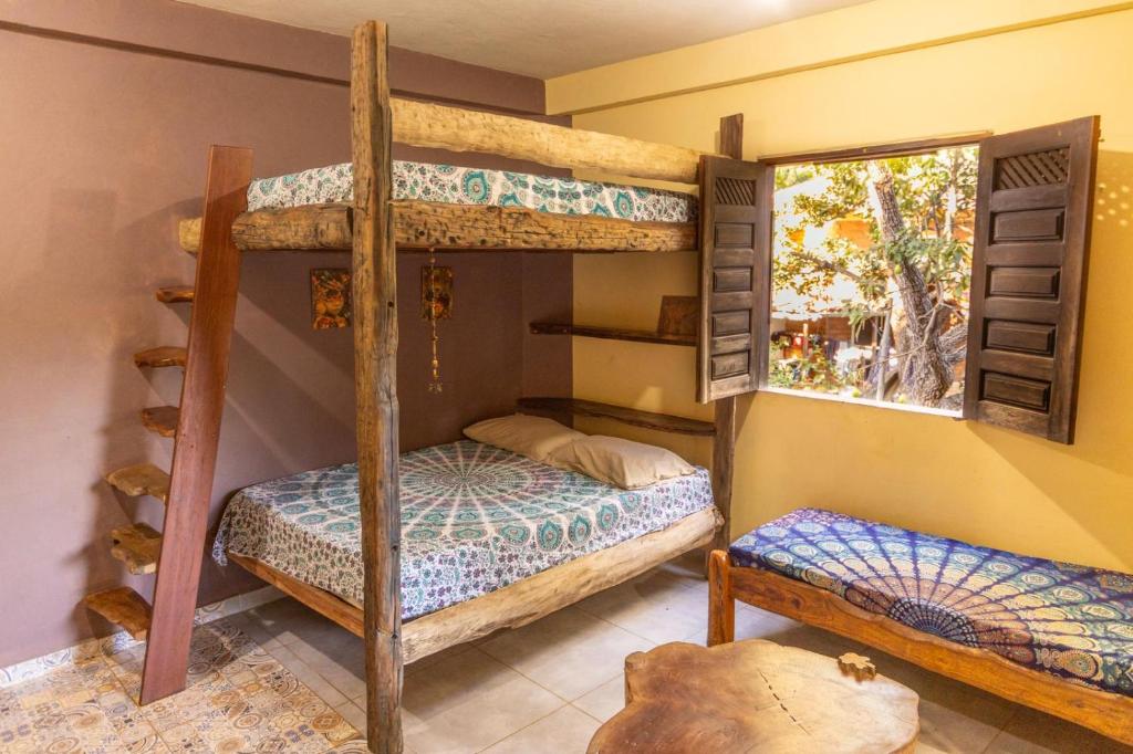 Μία ή περισσότερες κουκέτες σε δωμάτιο στο Recanto Pitanga