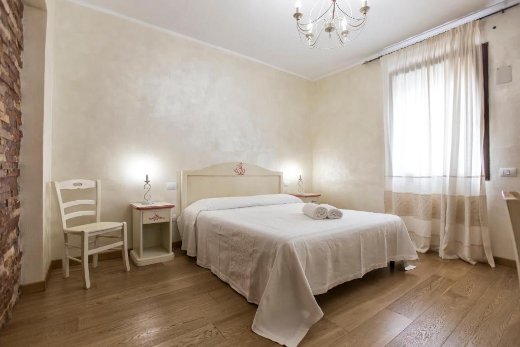 Postel nebo postele na pokoji v ubytování Morpheo Rooms