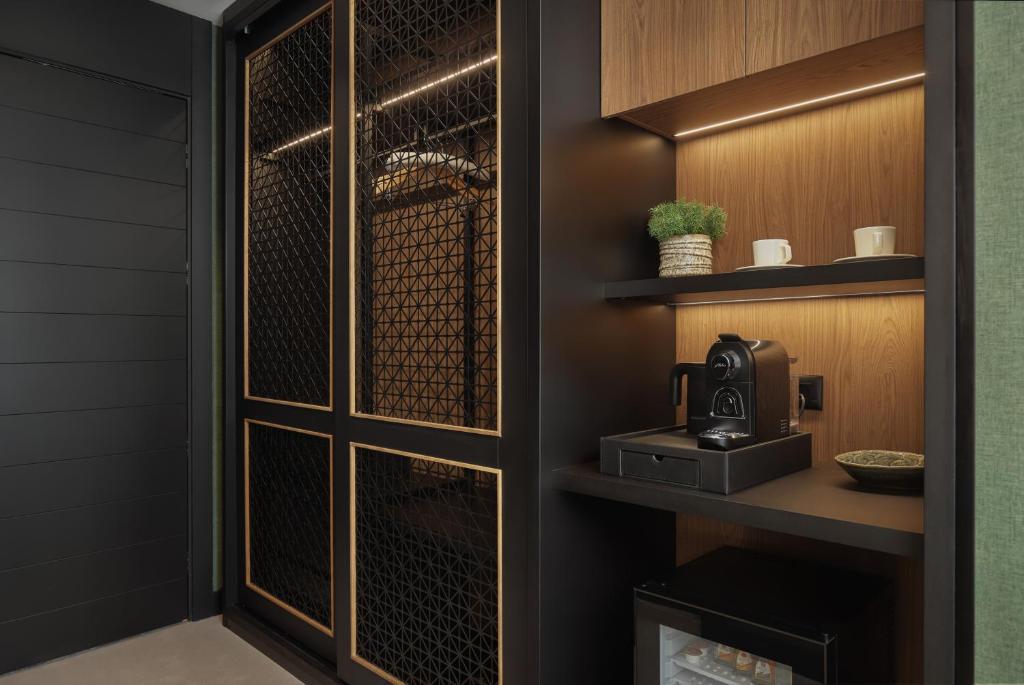 Kuchyň nebo kuchyňský kout v ubytování Wulfenia Hotel & Spa