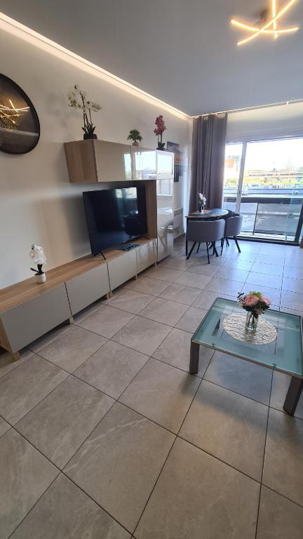 TV a/nebo společenská místnost v ubytování SEA SIDE studio