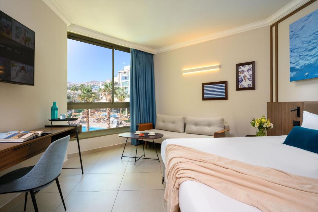 Ein Bett oder Betten in einem Zimmer der Unterkunft U Magic Palace