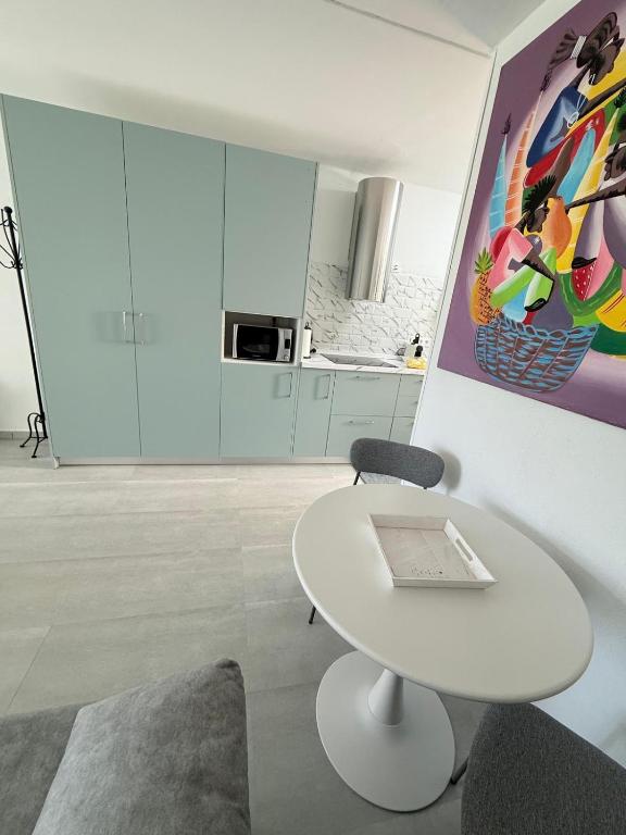 Kuchyň nebo kuchyňský kout v ubytování Al Sole Studios residence Playa Roca