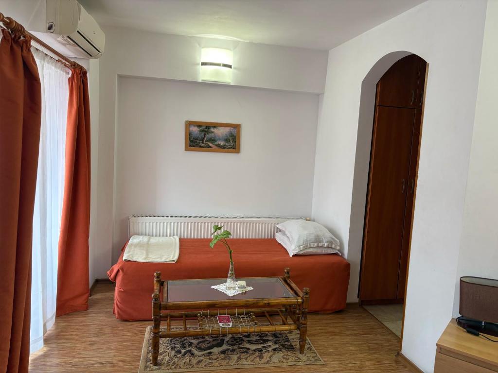 Postel nebo postele na pokoji v ubytování Family Hotel Flora