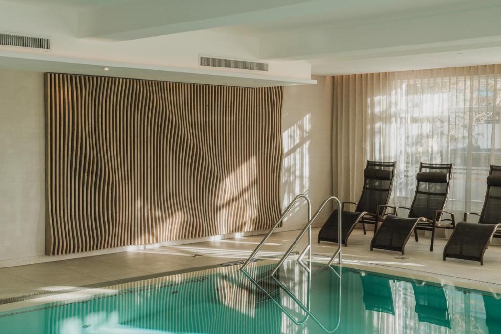 Bazén v ubytování Wilfinger Ring Bio Hotel nebo v jeho okolí