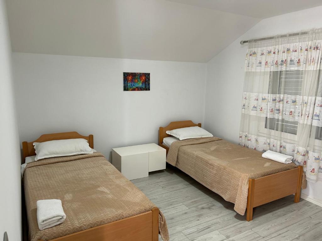 Postel nebo postele na pokoji v ubytování HENRI'S APARTAMENT