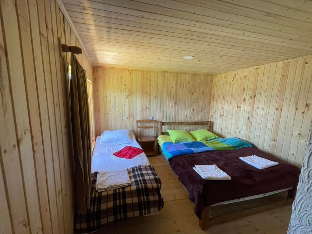 Postel nebo postele na pokoji v ubytování House In The Mountains-Heshkili