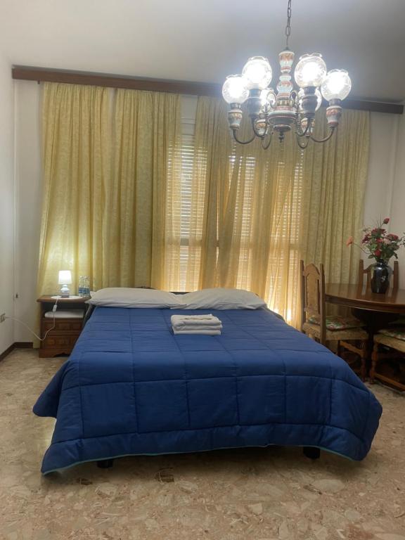Postel nebo postele na pokoji v ubytování FAMAGOSTA Home