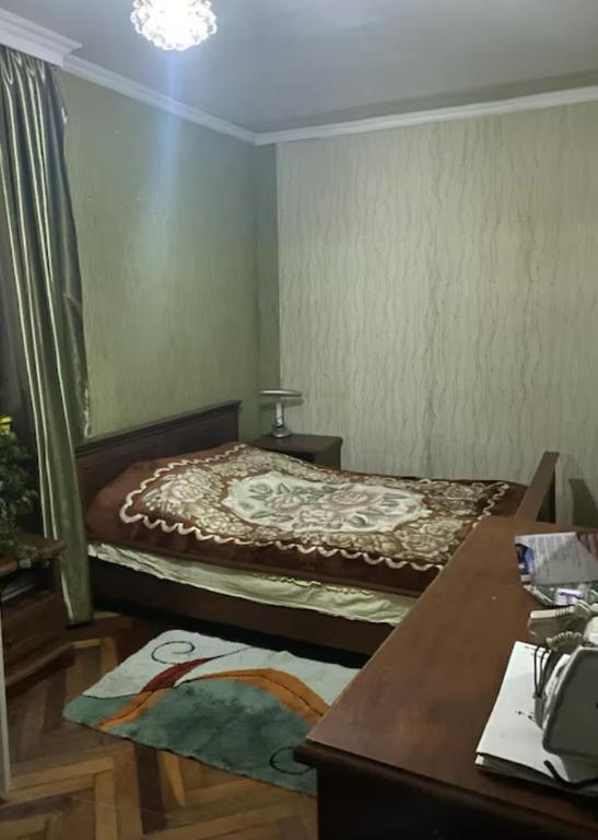 Postel nebo postele na pokoji v ubytování Cheap Hostel Kutaisi
