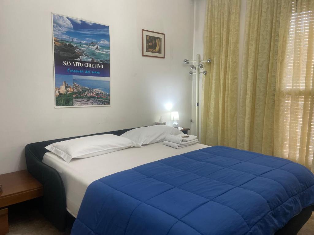 Postel nebo postele na pokoji v ubytování FAMAGOSTA Home