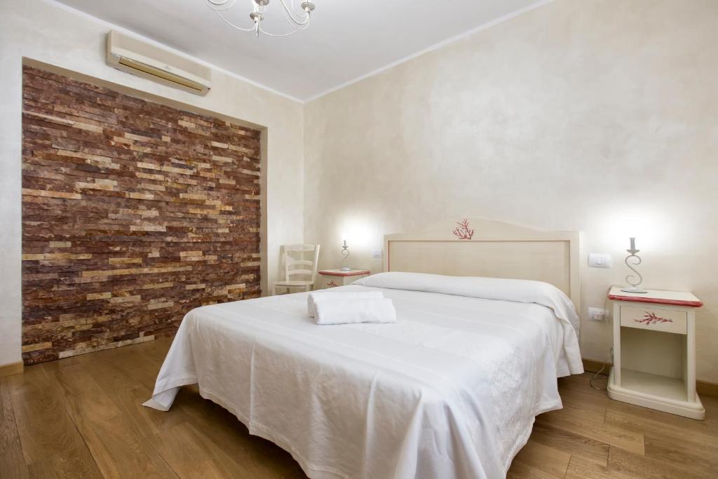 Postel nebo postele na pokoji v ubytování Morpheo Rooms