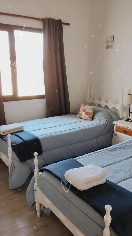 Ένα ή περισσότερα κρεβάτια σε δωμάτιο στο Alojamiento elaleman