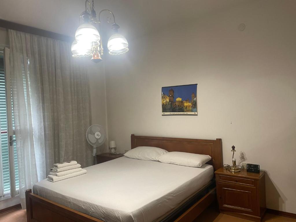 Postel nebo postele na pokoji v ubytování FAMAGOSTA Home