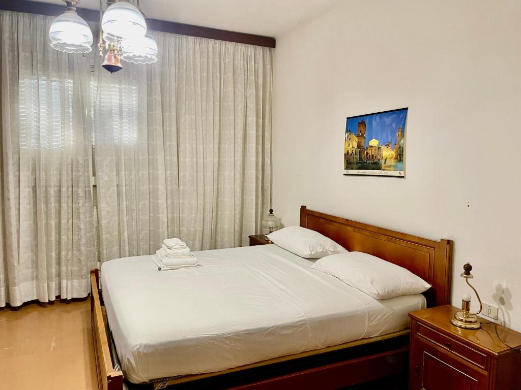 Postel nebo postele na pokoji v ubytování FAMAGOSTA Home