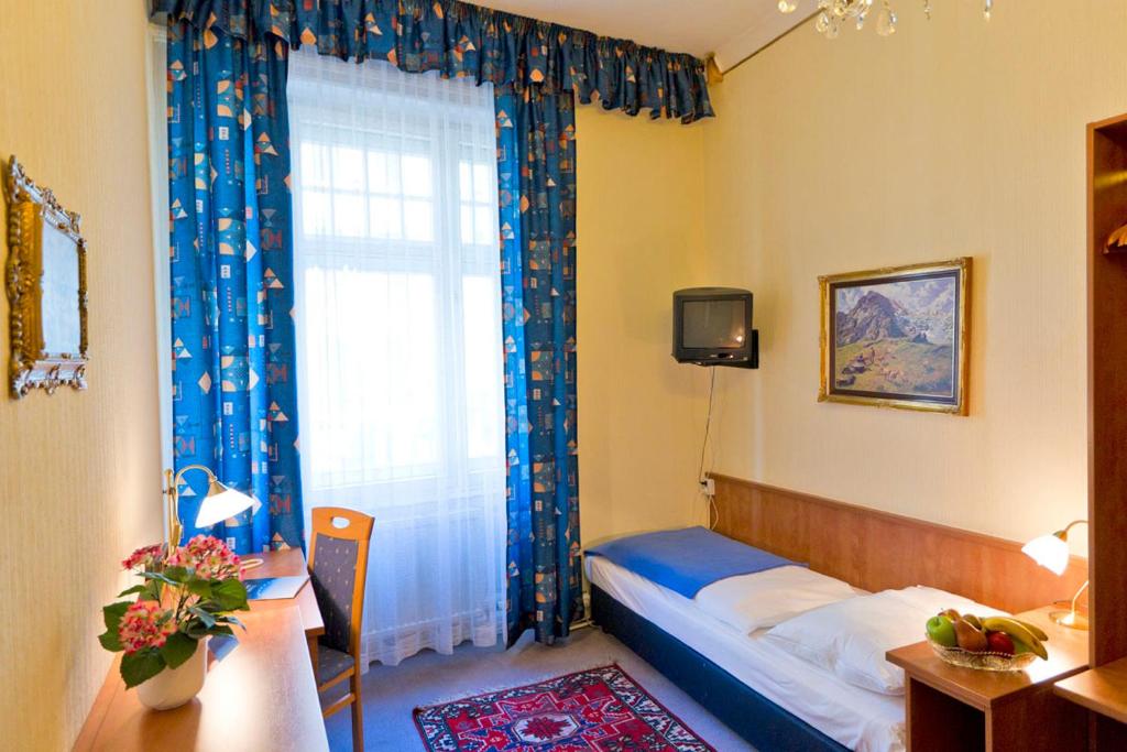 Postel nebo postele na pokoji v ubytování Hotel-Pension Bleckmann