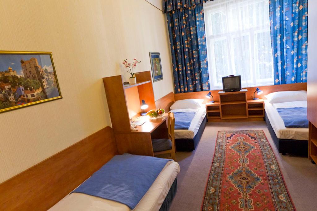Postel nebo postele na pokoji v ubytování Hotel-Pension Bleckmann