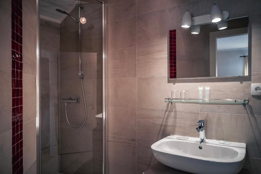 Koupelna v ubytování Hotel Au Vieux Moulin