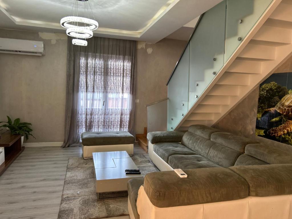 Posezení v ubytování HENRI'S APARTAMENT