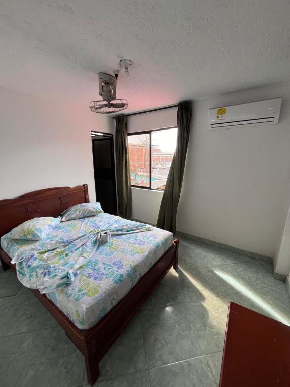 Postel nebo postele na pokoji v ubytování Hotel Mi Ranchito