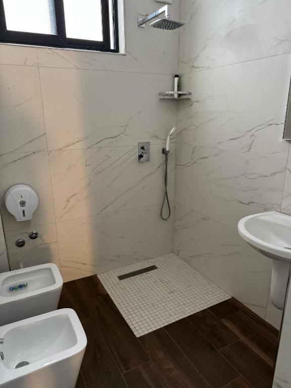 Koupelna v ubytování Hotel Europa
