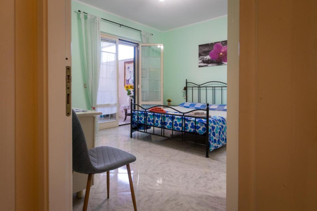 Postel nebo postele na pokoji v ubytování Casa Marcy