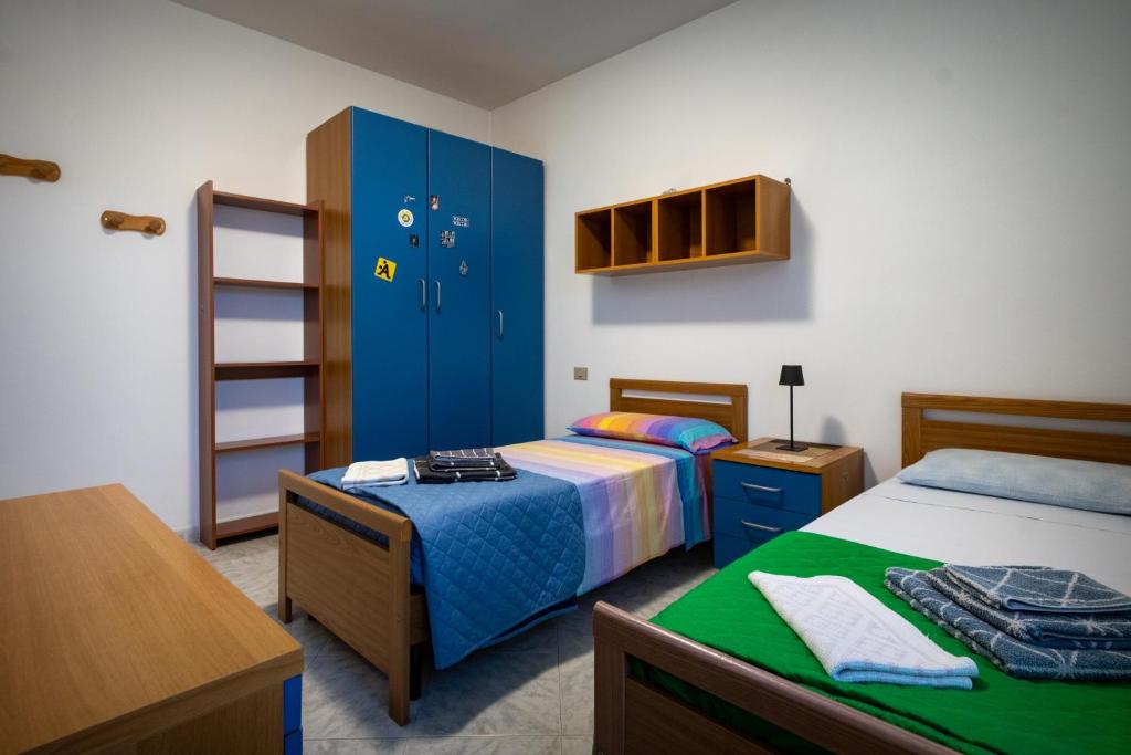 Postel nebo postele na pokoji v ubytování Casa Marcy