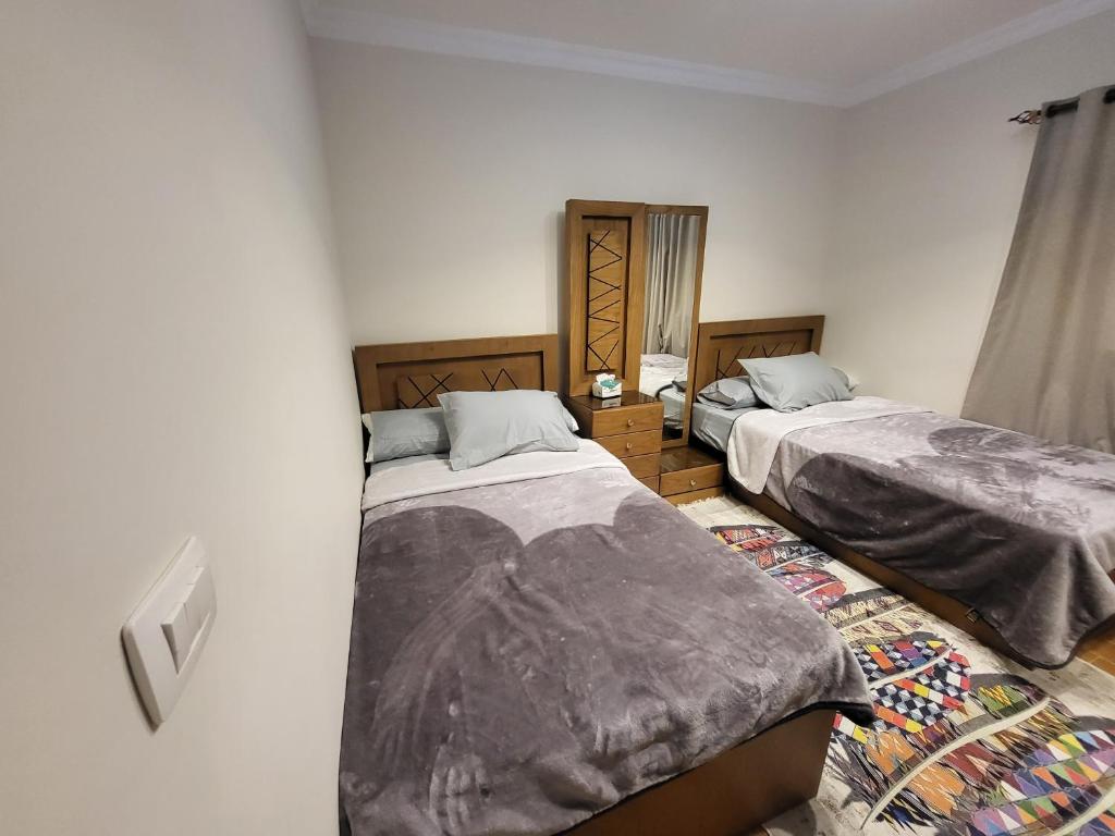 Postel nebo postele na pokoji v ubytování La Casa Chic retreat New cairo