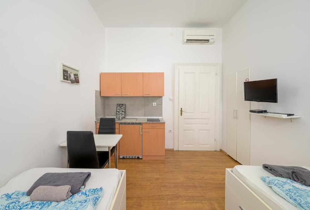 Kuchyň nebo kuchyňský kout v ubytování Apartments Todorovic