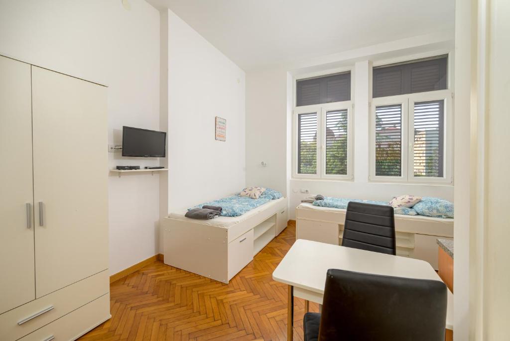 Postel nebo postele na pokoji v ubytování Apartments Todorovic