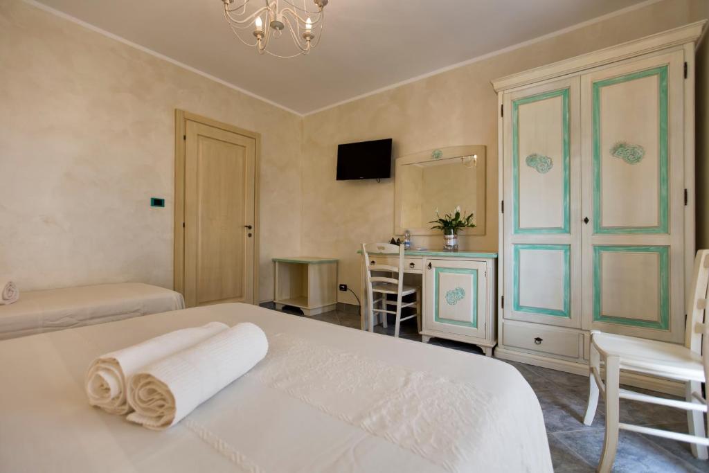 Postel nebo postele na pokoji v ubytování Morpheo Rooms