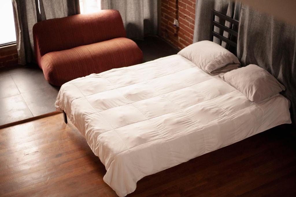 Postel nebo postele na pokoji v ubytování Coyote Lofts-Estacion Federal