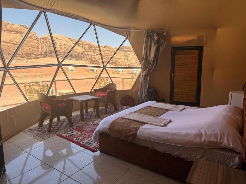 Voodi või voodid majutusasutuse Wadi Rum albasli camp toas