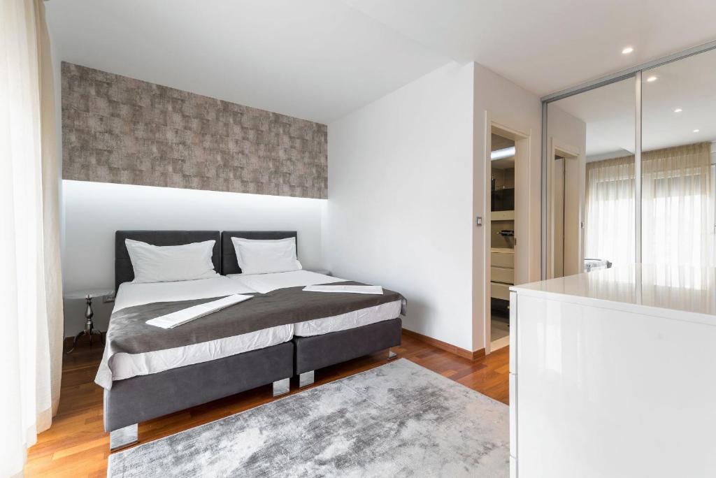Postel nebo postele na pokoji v ubytování Hotel - Teranea City Hvar