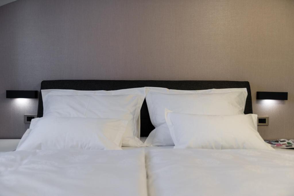 Postel nebo postele na pokoji v ubytování Hotel - Teranea City Hvar