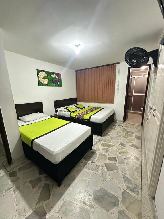 Postel nebo postele na pokoji v ubytování Hotel Astorias