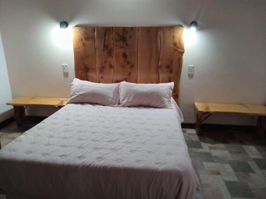 Letto o letti in una camera di Jireh