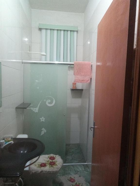Koupelna v ubytování Quarto de Hóspedes da Menina Maricotinha