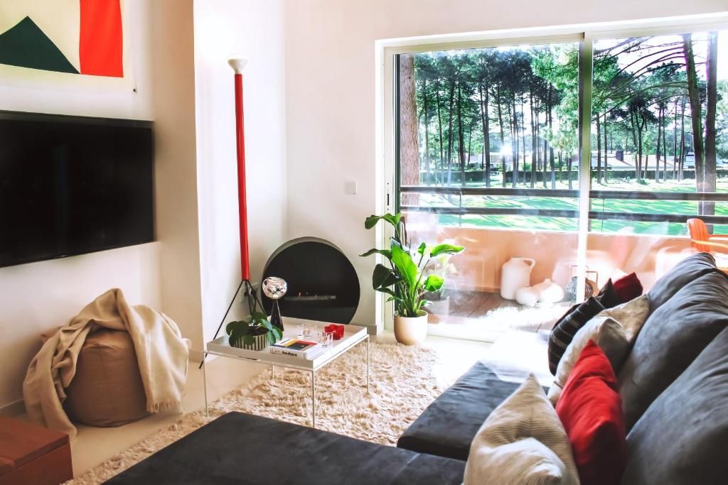 Χώρος καθιστικού στο Greenview Golf Apartment