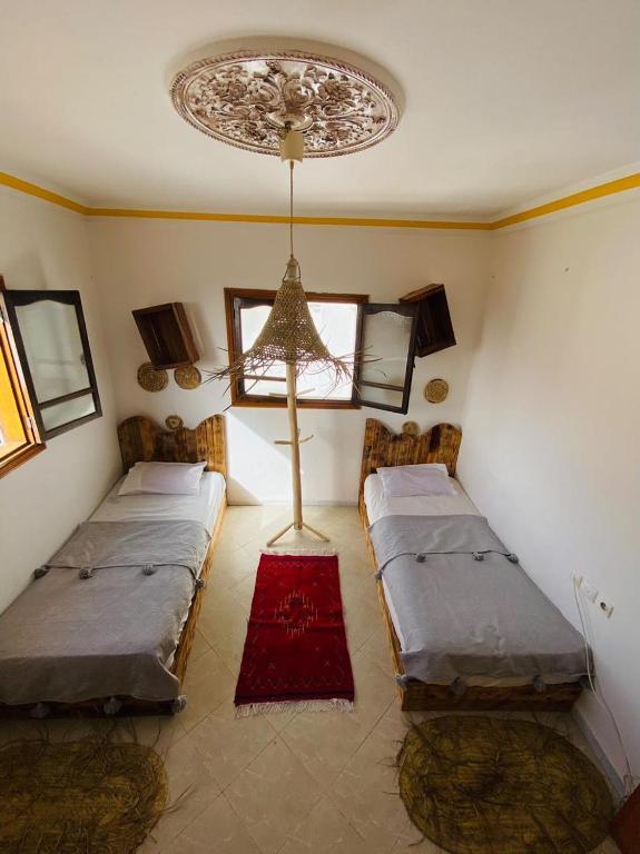 Voodi või voodid majutusasutuse Itri Surf Hostel Taghazout toas